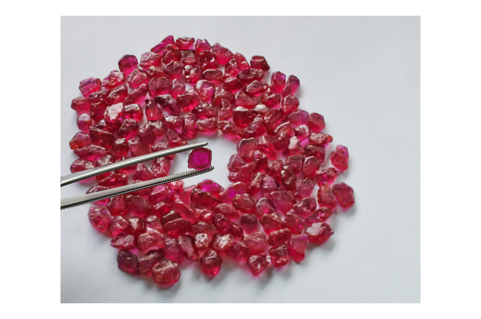Faceted FURA Mozambican rubies showing pigeon-blood red color and fluorescence