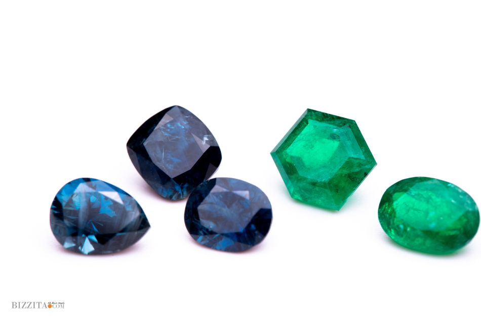 Blue and green gemstones displayed for Rapnet sourcing